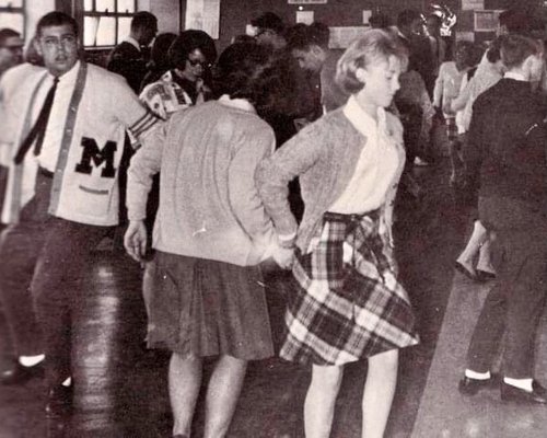A picture from the 1965 McQuaid yearbook. Yes, that’s me with the letter sweater dancing up a sto...