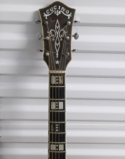 Oh yes, and we still buy guitars, especially ones like this built in Buffalo, New York by Carmelo...