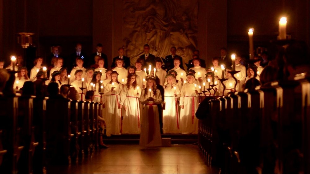 A St. Lucy celebration in Scandinavia. Today marks the return of the light as it is 12 days befor...