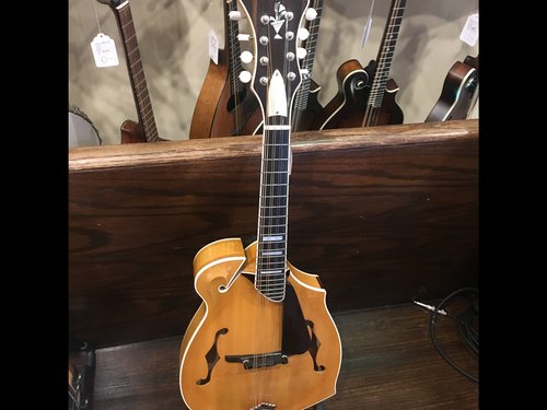 And original Italian made Giocomel mandolin. When you play it, you weep tears of olive oil.