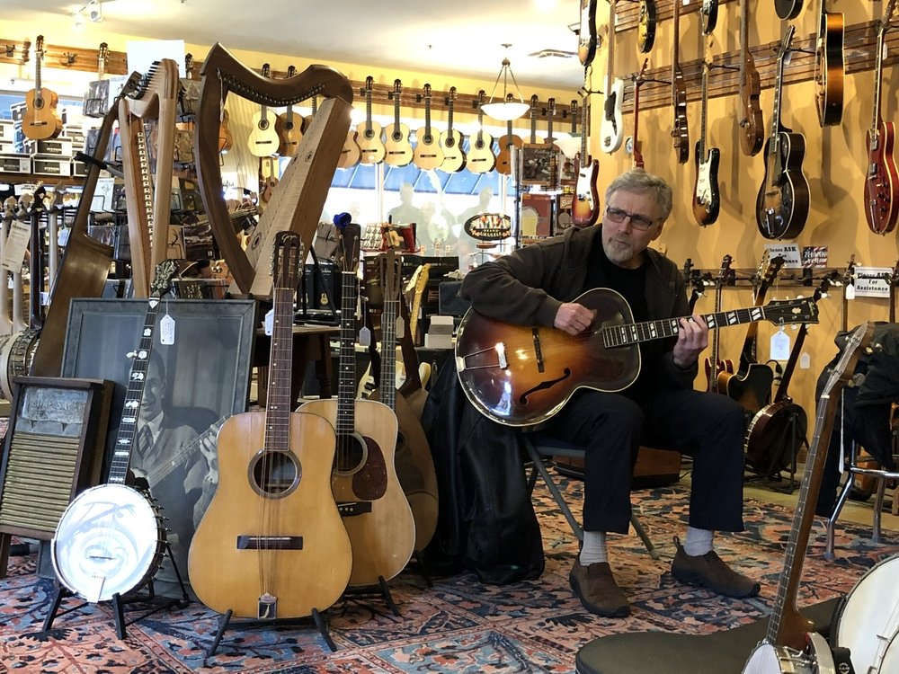 Fred Vine contemplates adding a nice old guitar to his arsenal