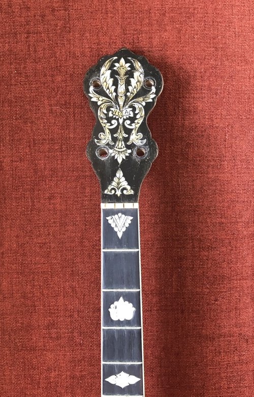 Beautifully inlaid Vega Deluxe tenor banjo neck in need of some restoration.