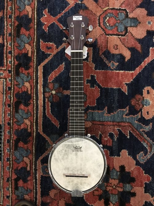 The mini Recording King banjo Uke is modeled after the Gibson UB-1.