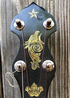 Eastman &nbsp;peghead with "Griffin" inlay