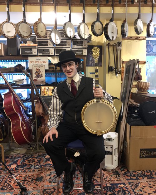 Gavin, a second-year student at Eastman School of Music is decked out in vintage clothing (he ass...