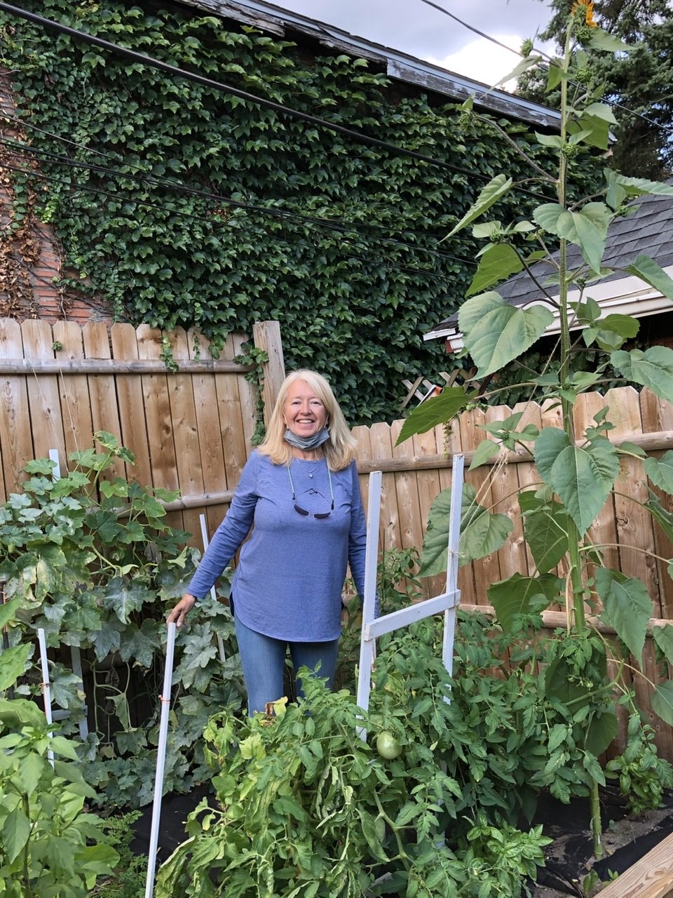Julie had to get back to her garden. Her sunflower is getting out of control. It may be a candida...