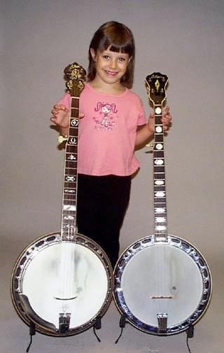 Grace with two original Gibson flathead banjos. Including the top tension style&nbsp;7