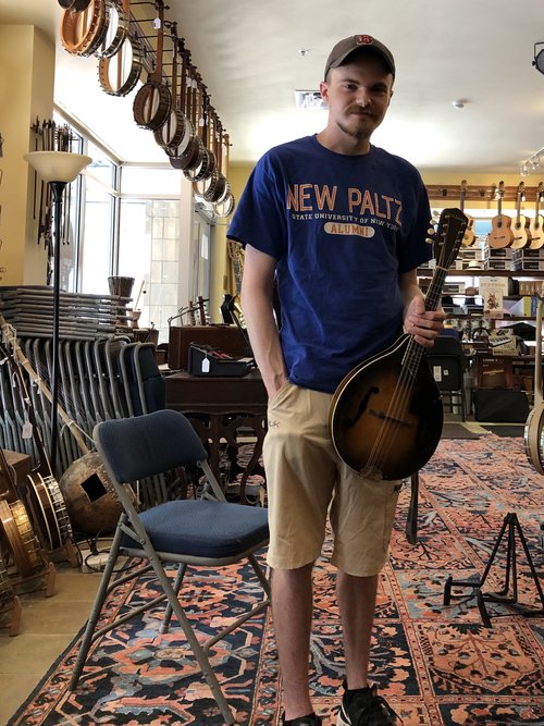 A doctoral candidate in music composition stopped in to buy a mandolin!!