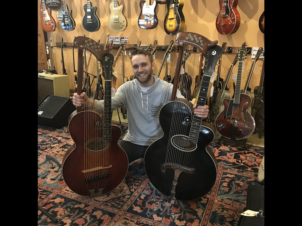 Ryan Yarmel proudly displays TWO Gibson Harp-guitars.