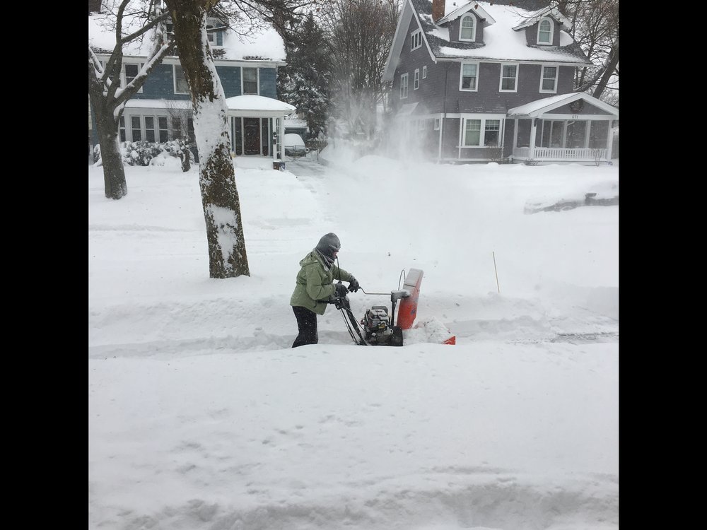 Julie tries out her new snowblower and goes to town in the neighborhood sidewalks
