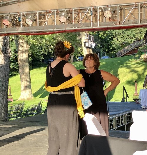 My beautiful sister Liz lends an ear to Beth’s sister, Lisa, the maid of honor