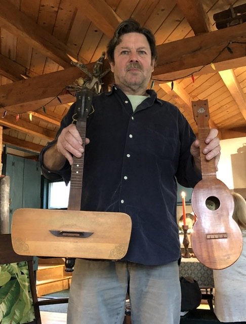 Our dear friend Billy Voiers with some of his favorite ukuleles