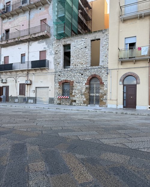 and when the building next-door to yours is just an empty frame how do you handle that?