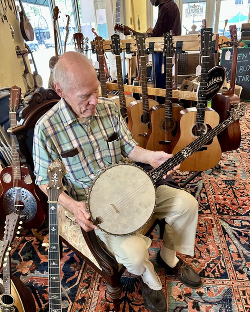 Drew Frech, banjo master, stopped by the store to check out a Stewart presentation banjo we just ...