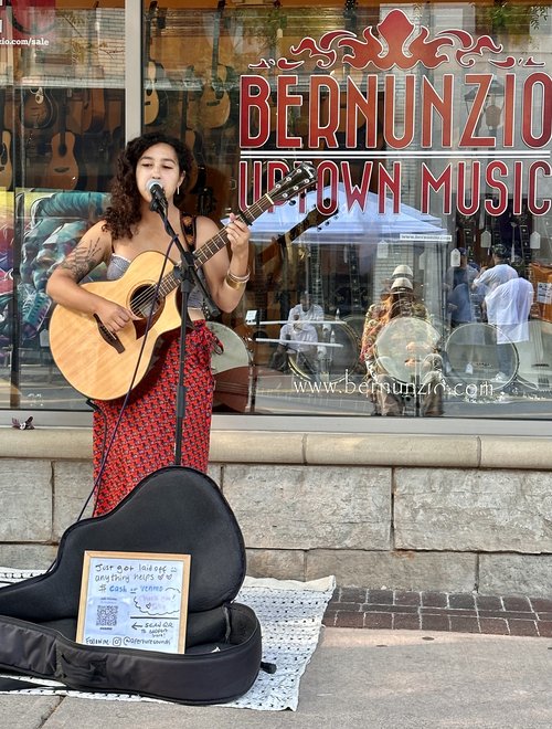 Two times during the Jazz Fest, the front sidewalk of Bernunzio Uptown Music was graced by the he...