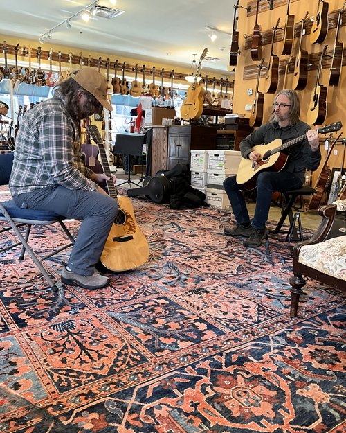 These two old guys came in to try out guitars. I knew them when they were young kids in college. ...