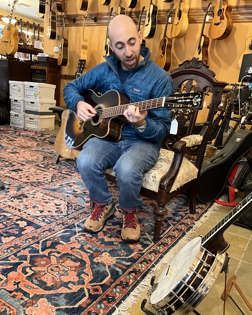 This young man from Los Angeles stopped by to try out a H.F. Eibert guitar, which we have just re...