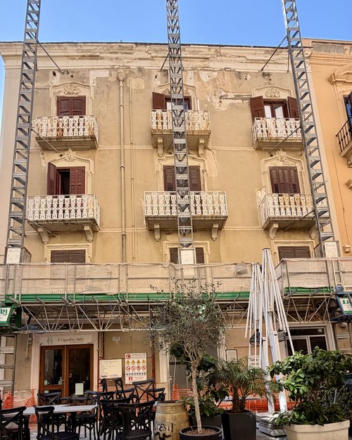 Because the buildings are all attached to each other the restoration of one interrupts everything...