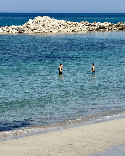 Two crazy "birds" swimming in March!