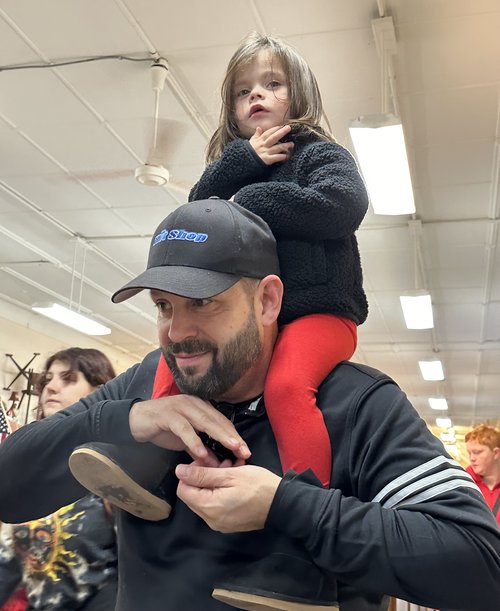 The line wrapped around the counter and out the store to check out and pay for the candy that the...