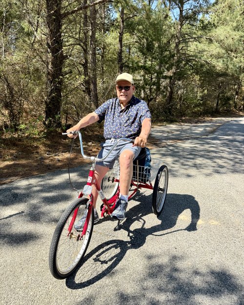 I rented a tricycle to pedal around the island. It was great fun, but paid the price the next day!