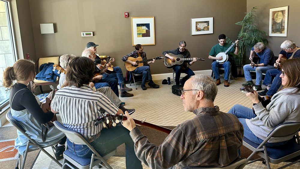 Ben Proctor’s beginner bluegrass jam is a group of friends who enjoy each other’s company. The ca...