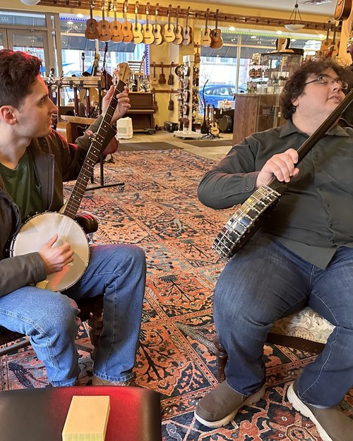 These new friends played banjo all afternoon. They left with lots of new ideas!