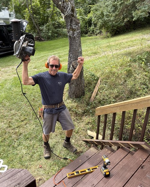 My brother-in-law Steve repairing our deck he’s a man with a saw, whereas I use a spatula for my ...