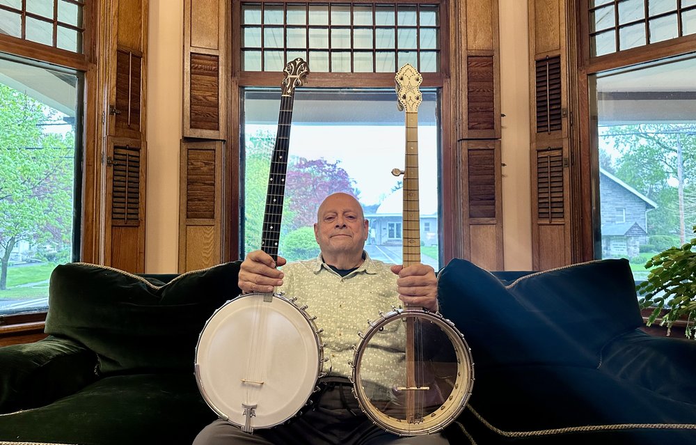 In our front living room with the first Bacon and Day Montana banjo made AND, what us p...