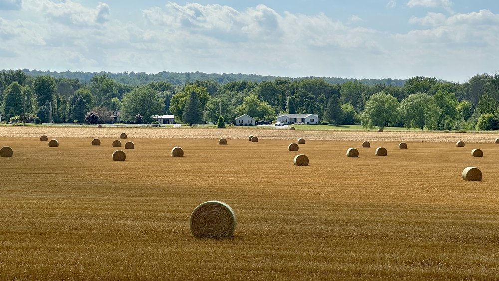 Haying time just south of Gorham, New York…even though this is straw!!