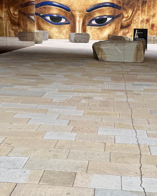 The entrance to the deYoung museum was interestingly appointed with cracks through the pavement, ...
