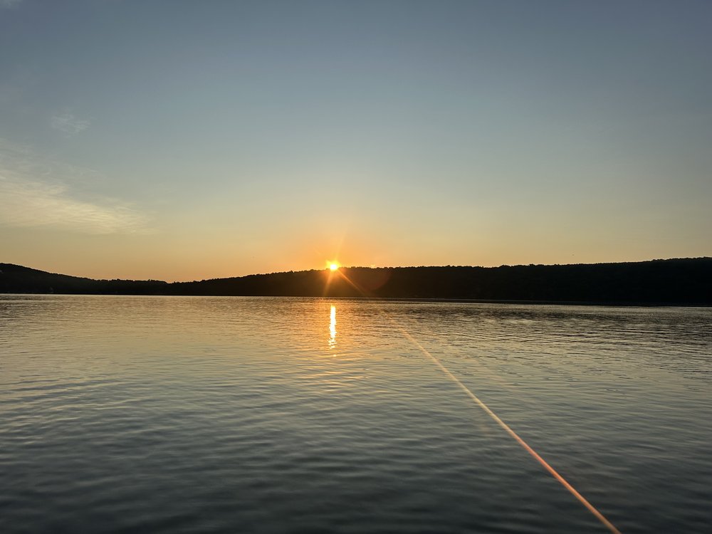 The sun pops over the hill on the Branchport side of the lake near the Keuka State Park.
