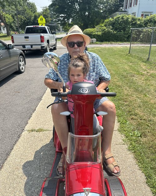 Olive insisted on operating my deluxe scooter