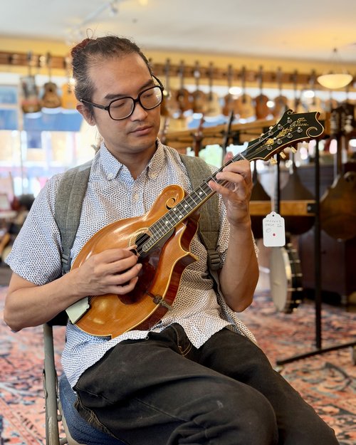 Ken Luk, musician extraordinaire. He holds a doctorate in from the Eastman School of Music. He pl...