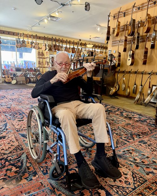 This nonagenarian was wheeled into our store by his caretaker. He had played violin when he was a...