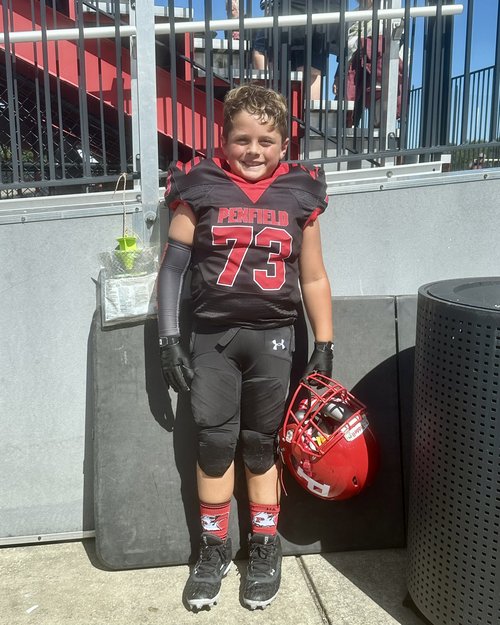 Rocco John Bernunzio’s first football game.